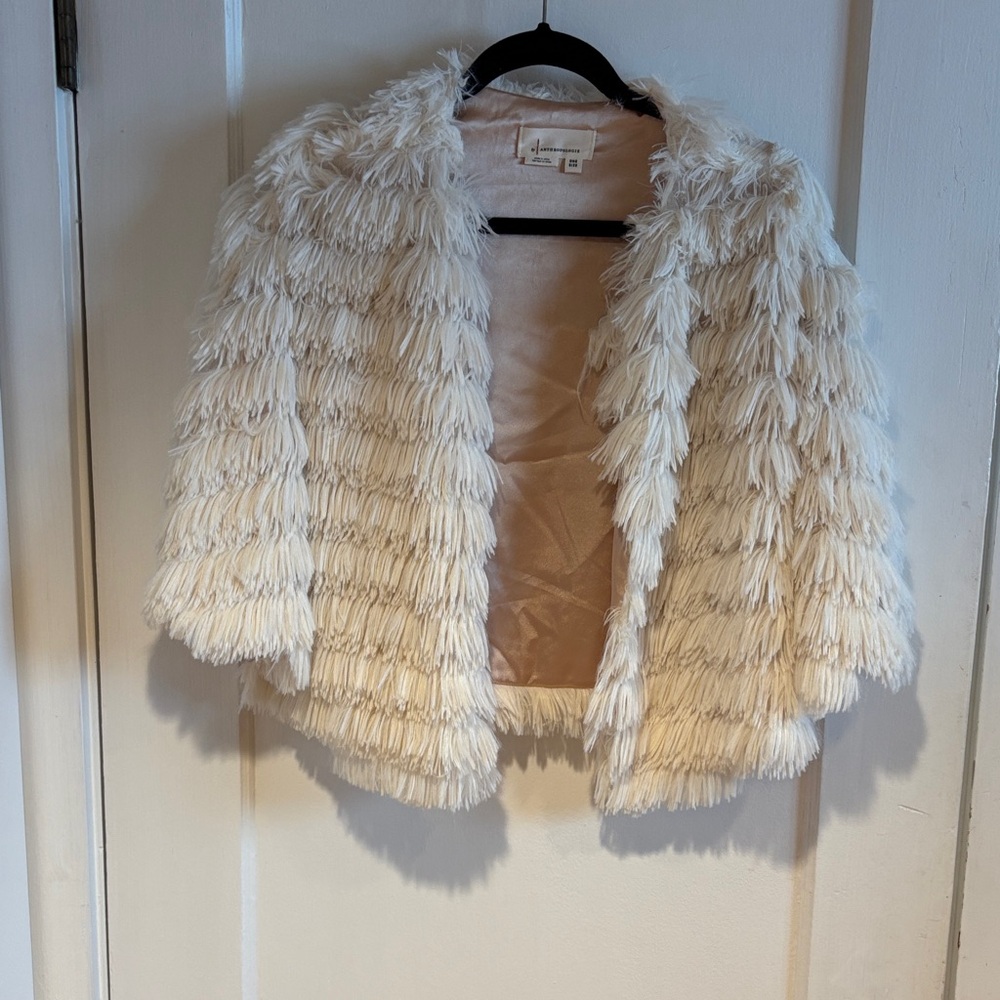 Anthropologie Ivory Faux-Fur cape, great for evening wear. One size fits most.